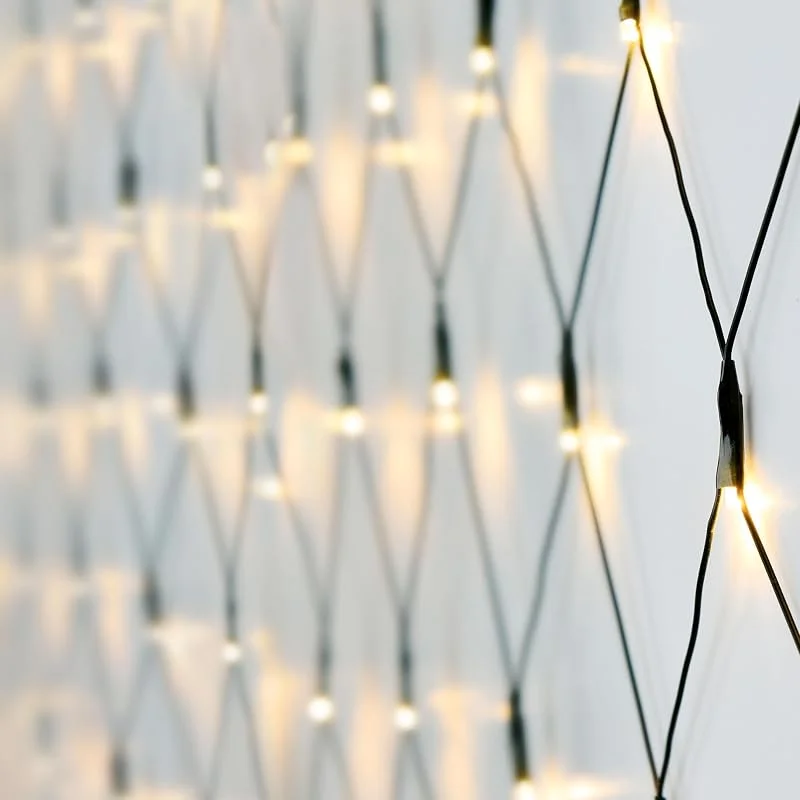 Besuche den Spetebo-Store Spetebo Lichternetz 1, 5x1, 5 m - 100 LED warmweiß - mit Stromstecker + Timer Funktion - Deko Lichterkette Netz Außen — Weihnachtsbeleuchtung