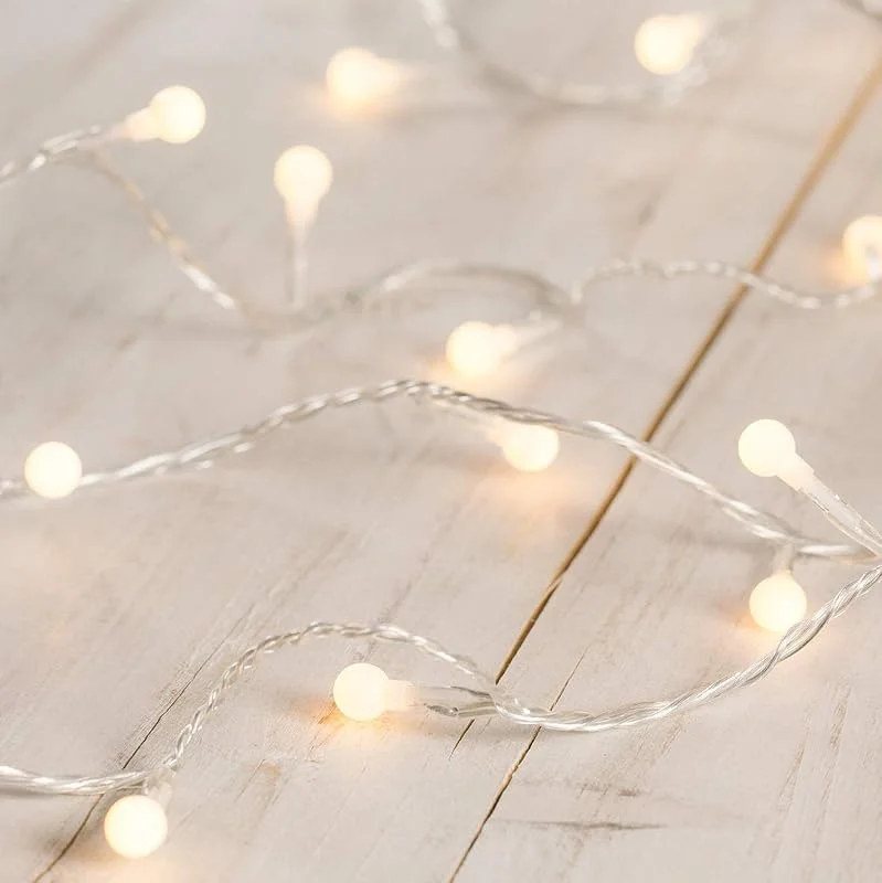 Besuche den Lights4fun-Store Lights4fun 40er LED Kleine Kugel Lichterkette mit warm weißem Licht 6 m Strombetrieb Lichterkette Innen mit Stecker [Energieklasse A++] Deko Kinderzimmer Wohnzimmer Party — Kerzenlicht Abendessen