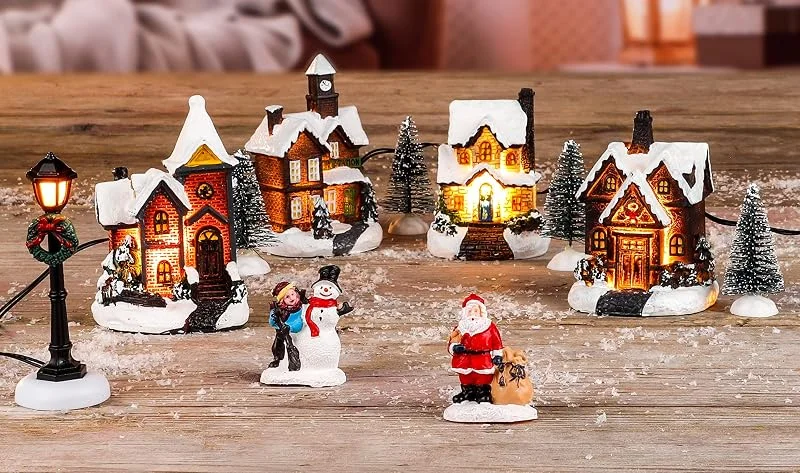Besuche den Spetebo-Store Spetebo LED Weihnachtsstadt - Set 11-teilig - mit 5 warmweißen LED - Weihnachtsdorf Tischdeko Fensterdeko beleuchtet — Weihnachtsdeko