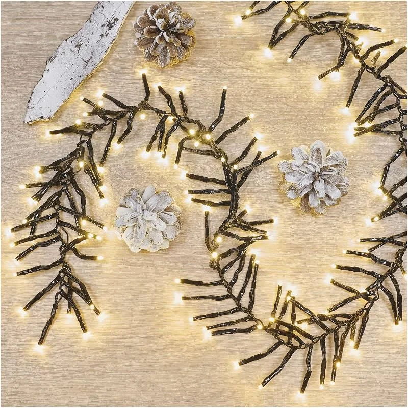 Besuche den EMOS-Store EMOS LED-Lichterkette Cluster warmweiß für Innen und Außen, 7, 2m lange Weihnachtslichterkette IP44 mit 960 LEDs + 5m Zuleitung und Netzteil, effektvolle Lichtmodi, für Party, Weihnachten, Deko — Weihnachtsbeleuchtung