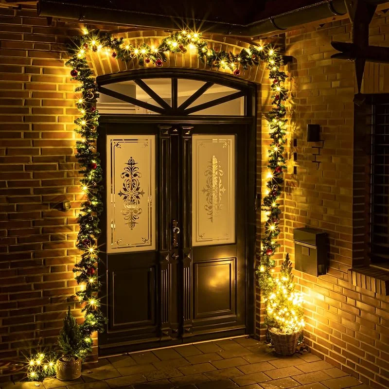 Besuche den Spetebo-Store Spetebo LED Weihnachtsgirlande mit Lichterkette - grün, 5m - Kunsttanne Girlande inklusive 36 Christbaumkugeln - Garten Deko Beleuchtung warm weiß für Innen und Außen — Weihnachtsdeko